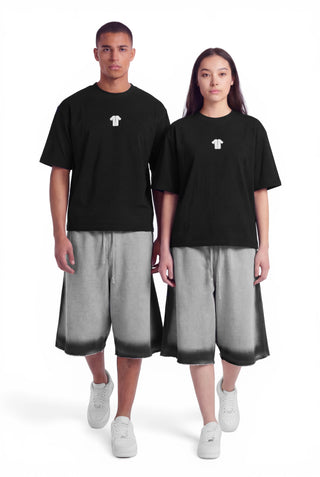 Two people wearing black t-shirts and gray shorts on a white background
